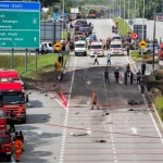 Ten killed after private jet crashes on a highway in Malaysia