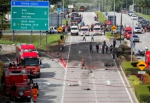 Ten killed after private jet crashes on a highway in Malaysia